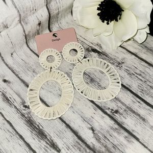 White dangle boho/tiki style earrings